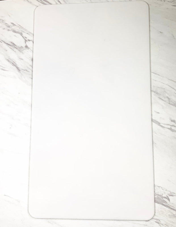 White latex practice pad.
